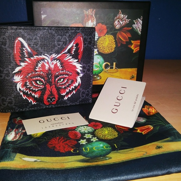 gucci supreme wolf wallet